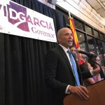 David Garcia, Democratic candidate for Arizona governor, speaks Tuesday, Aug. 28, 2018 at a victory celebration at a restaurant in Phoenix. Garcia, a Latino education professor, beat state Sen. Steve Farley and Kelly Fryer, former CEO of the YWCA Southern Arizona, to win the Democratic nomination for governor. (AP Photo/Anita Snow)