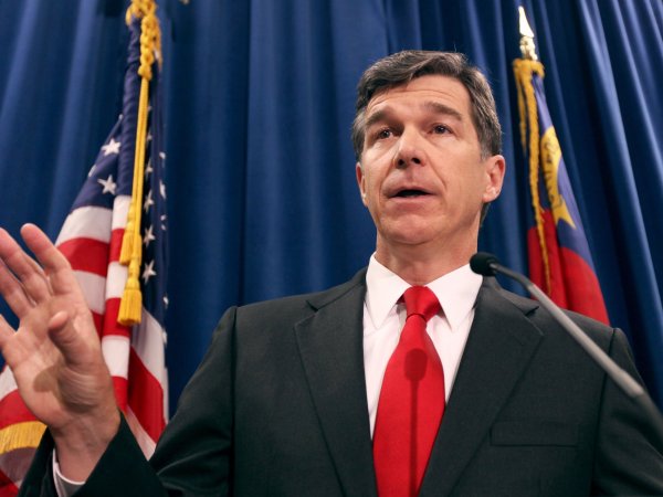North Carolina Attorney General Roy Cooper, a Democrat, has condemned his state's Republican-sponsored voter ID law and constitutional amendment to ban same-sex marriage. But in his position he must defend the state against lawsuits on both issues. (Takaaki Iwabu/Raleigh News & Observer/MCT)