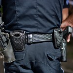 SANTA FE, NM - JULY 4, 2018:  A police officer keeps an eye on the crowd at a Fourth of July holiday event in Santa Fe, New Mexico. (Photo by Robert Alexander/Getty Images)