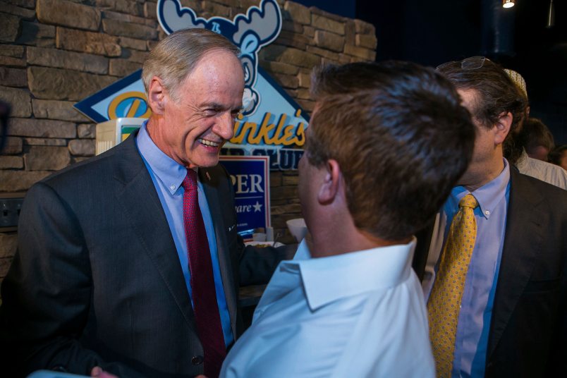 Incumbent U.S. Sen. Tom Carper shakes hands from his supportert as he beats progressive political newcomer Kerri Evelyn Harris.