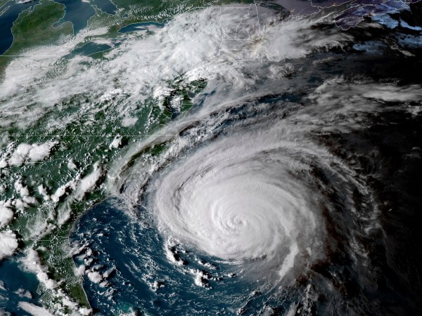 This enhanced satellite image made available by NOAA shows Hurricane Florence off the eastern coast of the United States on Wednesday, Sept. 12, 2018 at 5:52 p.m. EDT. (NOAA via AP)