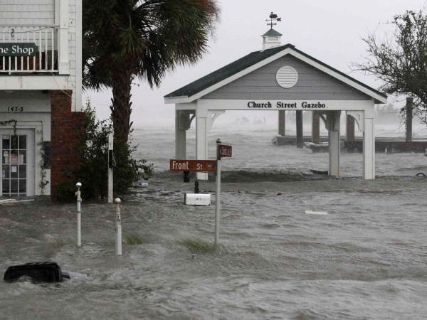 High winds and water as Hurricane Florence hit Front Street in downtown Swansboro N.C.,Friday, Sept. 14, 2018.  (AP Photo/Tom Copeland)