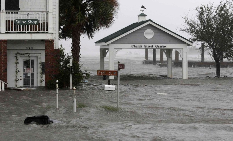 High winds and water as Hurricane Florence hit Front Street in downtown Swansboro N.C.,Friday, Sept. 14, 2018.  (AP Photo/Tom Copeland)