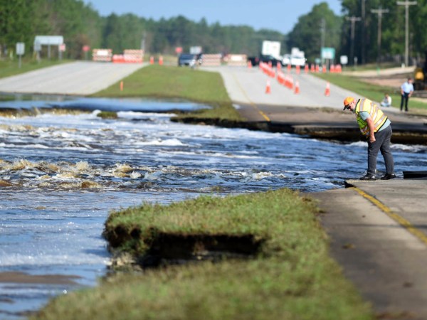 Flooding from Sutton Lake has washed away part of U.S. 421 in New Hanover County just south of the Pender County line in Wilmington, N.C., Friday, September 21, 2018.  [Matt Born/StarNews Photo]