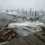 Waves crash around the Oceana Pier as the outer edges of Hurricane Florence being to affect the coast September 13, 2018 in Atlantic Beach, United States. Coastal cities in North Carolina, South Carolina and Virgnia are under evacuation orders as the Category 2 hurricane approaches the United States.