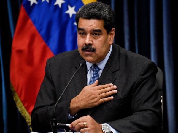 Venezuelan President Nicolas Maduro gives a press conference to the international media following his recent trip to China, at Miraflores Presidential Palace in Caracas, on September 18, 2018. (Photo by Federico PARRA / AFP)        (Photo credit should read FEDERICO PARRA/AFP/Getty Images)