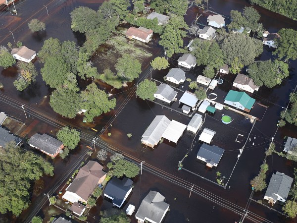 LUMBERTON, NC - SEPTEMBER 20:  Flood waters are seen surrounding homes after heavy rains from Hurricane Florence on September 20, 2018 in Lumberton, North Carolina. Residents have begun cleaning up in North Carolina as the flooding has begun to subside.  (Photo by Joe Raedle/Getty Images)