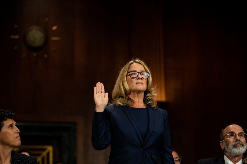 WASHINGTON, DC - SEPTEMBER 27:  Christine Blasey Ford is sworn in prior to giving testimony before the U.S. Senate Judiciary Committee at the Dirksen Senate Office Building on Capitol Hill September 27, 2018 in Washington, DC. Blasey Ford, a professor at Palo Alto University and a research psychologist at the Stanford University School of Medicine, has accused Supreme Court nominee Brett Kavanaugh of sexually assaulting her during a party in 1982 when they were high school students in suburban Maryland.