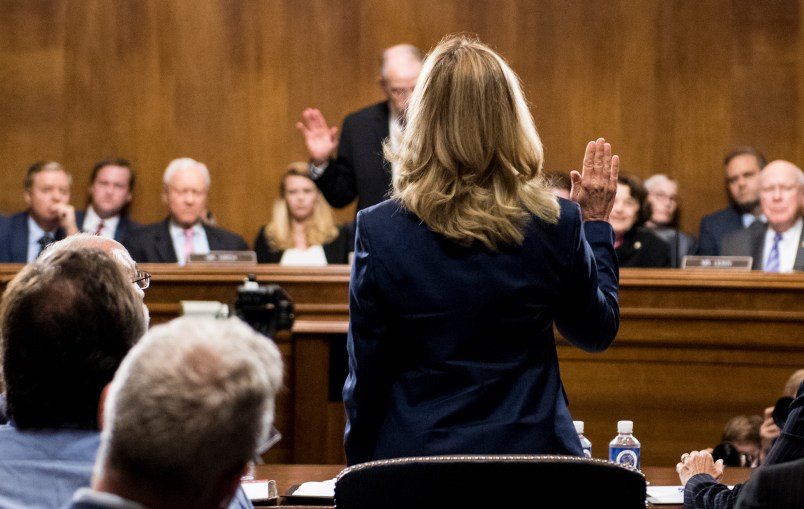 WASHINGTON, DC - SEPTEMBER 27: Dr. Christine Blasey Ford is sworn in by chairman Chuck Grassley, R-Iowa, on Capitol Hill September 27, 2018 in Washington, DC. A professor at Palo Alto University and a research psychologist at the Stanford University School of Medicine, Ford has accused Supreme Court nominee Judge Brett Kavanaugh of sexually assaulting her during a party in 1982 when they were high school students in suburban Maryland. (Photo By Tom Williams-Pool/Getty Images)