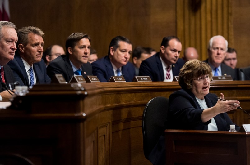 WASHINGTON, DC - SEPTEMBER 27: Rachel Mitchell, counsel for Senate Judiciary Committee Republicans, questions Dr. Christine Blasey Ford as Senators, from left, Mike Crapo, R-Idaho, Jeff Flake, R-Ariz., Ben Sasse, R-Neb., Ted Cruz, R-Texas, Mike Lee, R-Utah., and John Cornyn, R-Texas, listen during the Senate Judiciary Committee hearing on the nomination of Brett M. Kavanaugh on Capitol Hill September 27, 2018 in Washington, DC. A professor at Palo Alto University and a research psychologist at the Stanford University School of Medicine, Ford has accused Supreme Court nominee Judge Brett Kavanaugh of sexually assaulting her during a party in 1982 when they were high school students in suburban Maryland. (Photo By Tom Williams-Pool/Getty Images)