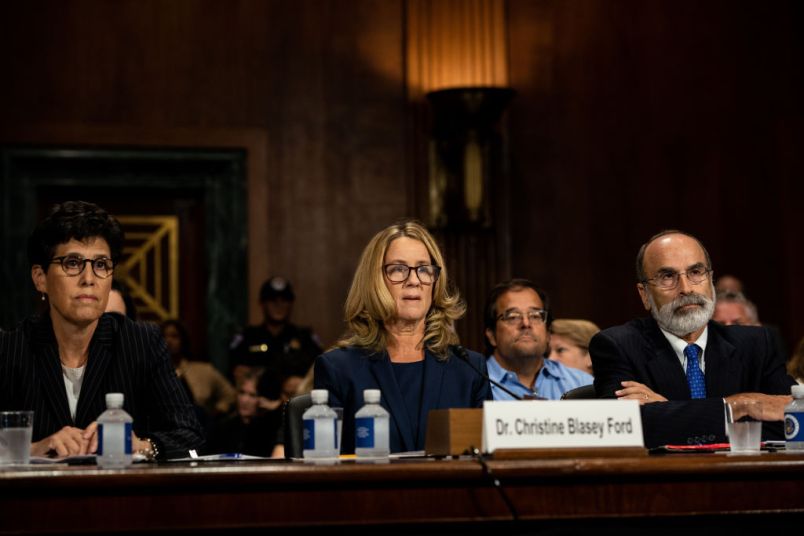 WASHINGTON, DC - SEPTEMBER 27:   Christine Blasey Ford listens to opening statements prior to testifying before the Senate Judiciary Committee at the Dirksen Senate Office Building on Capitol Hill September 27, 2018 in Washington, DC. Blasey Ford, a professor at Palo Alto University and a research psychologist at the Stanford University School of Medicine, has accused Supreme Court nominee Brett Kavanaugh of sexually assaulting her during a party in 1982 when they were high school students in suburban Maryland.  (Photo by Erin Schaff-Pool/Getty Images)