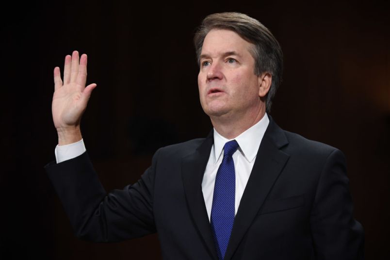 WASHINGTON, DC - SEPTEMBER 27: Supreme Court nominee Judge Brett Kavanaugh takes the oath before the US Senate Judiciary Committee in the Dirksen Senate Office Building on Capitol Hill September 27, 2018 in Washington, DC. A professor at Palo Alto University and a research psychologist at the Stanford University School of Medicine, Ford has accused Supreme Court nominee Judge Brett Kavanaugh of sexually assaulting her during a party in 1982 when they were high school students in suburban Maryland.  (Photo by Saul Loeb-Pool/Getty Images)