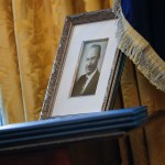 A portrait of President Donald Trump's father Fred Trump, and 3 un-signed Executive orders are seen in the Oval Office of the White House in Washington, Thursday, Feb. 9, 2017 during the swearing in ceremony for Attorney General Jeff Sessions. (AP Photo/Pablo Martinez Monsivais)