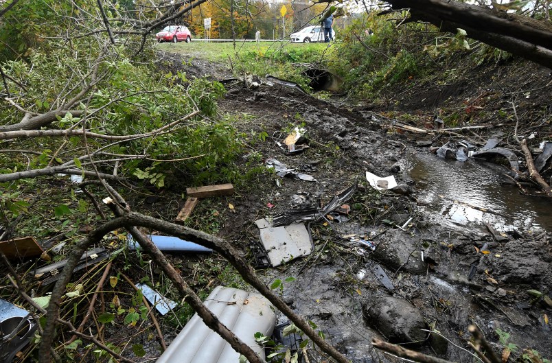 View of the fatal scene where a limousine crashed killing 20 people on Route 30 and 30 A on Oct. 6, 2018 as seen Saturday Oct. 7, 2018, in Schoharie, N.Y. (AP Photo/Hans Pennink)