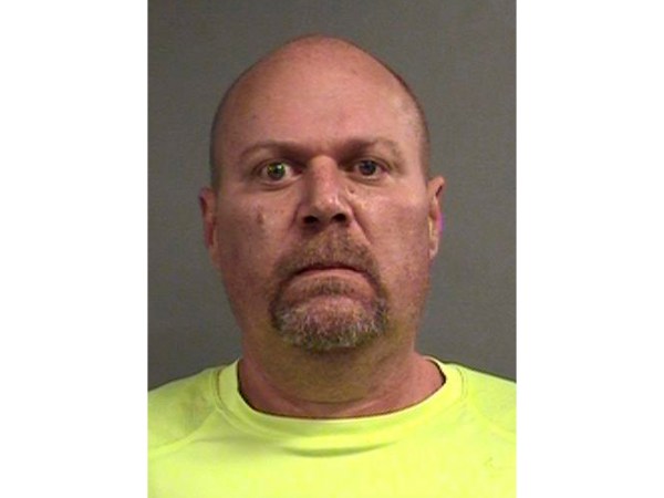 This photo provided by Louisville Metro Department of Corrections shows Gregory Alan Bush, who was booked early Thursday, Oct. 25, 2018, on two counts of murder and 10 counts of felony wanton endangerment, according to Louisville Metro Detention Center records. (Louisville Metro Department of Corrections via AP)