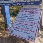 A red tide warning sing is seen at the Ocean Inlet Park in Ocean Ridge, Fla., Thursday, Oct. 4, 2018. Officials have confirmed that red tide has appeared on Florida's Atlantic Coast.  (Joe Cavaretta/South Florida Sun Sentinel/TNS)