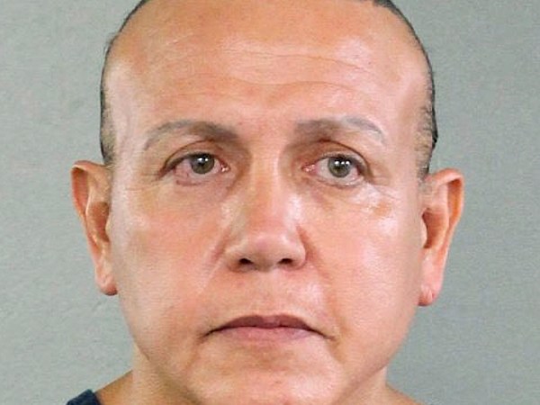 In this undated photo released by the Broward County Sheriff's office, Cesar Sayoc is seen in a booking photo, in Miami. Federal authorities took Cesar Sayoc, 56, of Aventura, Fla., into custody Friday in Florida in connection with the mail-bomb scare that earlier widened to 12 suspicious packages, the FBI and Justice Department said. (Broward County Sheriff's Office via AP)