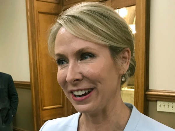 FILE - In this May 18, 2018, file photo, Arkansas Supreme Court Justice Courtney Goodson speaks to reporters at the Pulaski County Courthouse in Little Rock, Ark. A federal judge on Thursday, Nov. 1, 2018, rejected Goodson’s effort to halt attack ads and mailers from a Washington-based conservative group that is trying to unseat her in next week's election. Goodson is running against David Sterling, an attorney for the state Department of Human Services. (AP Photo/Andrew DeMillo, File)