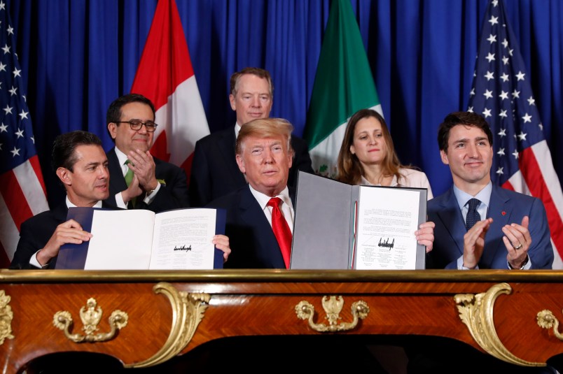 President Donald Trump with Argentina's President Mauricio Macri during their meeting at Casa Rosada, Friday, Nov. 30, 2018 in Buenos Aires, Argentina. (AP Photo/Pablo Martinez Monsivais)President Donald Trump, Canada's Prime Minister Justin Trudeau and Mexico's President Enrique Pena Neto participate in the USMCA signing ceremony, Friday, Nov. 30, 2018 in Buenos Aires, Argentina. (AP Photo/Pablo Martinez Monsivais)