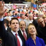 US senatorial candidate Attorney General Josh Hawley (l) and his wife Erin Morrow Hawleyare seen at a rally at JQH Arena in Springfield, Missouri on September 21, 2018. (Photo by MANDEL NGAN / AFP)        (Photo credit should read MANDEL NGAN/AFP/Getty Images)
