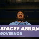 ATLANTA, GA - NOVEMBER 06:  Democratic Gubernatorial candidate Stacey Abrams addresses supporters at an election watch party on November 6, 2018 in Atlanta, Georgia.  Abrams and her opponent, Republican Brian Kemp, are in a tight race that is too close to call.  A runoff for Georgia's governor is likely.  (Photo by Jessica McGowan/Getty Images)