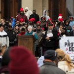 Sister Kathleen Nolan, a member of the Adrian Dominican Sisters in Adrian, Michigan, speaks out against Senate Bill 1171, or Michigan's One Fair Wage proposal, on Wednesday, Nov. 28, 2018, on the steps of the Michigan State Capitol in Lansing, Michigan. It's passage would revoke the raise Michigan’s tipped workers get under existing legislation. (AP Photo/Matthew Dae Smith/Lansing State Journal)