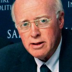 New Hampshire Secretary of State Bill Gardner, right, introduces one of the speakers at a meeting of the Presidential Advisory Commission on Election Integrity on Tuesday, Sept. 12, 2017 in Manchester, NH. Kansas Secretary of State Kris Kobach, center, and former Ohio Secretary of State Ken Blackwell, left, also attend. Gardner opened the meeting by defending his participation and the panel's existence, saying it hasn't yet reached any conclusion. (AP Photo/Holly Ramer)