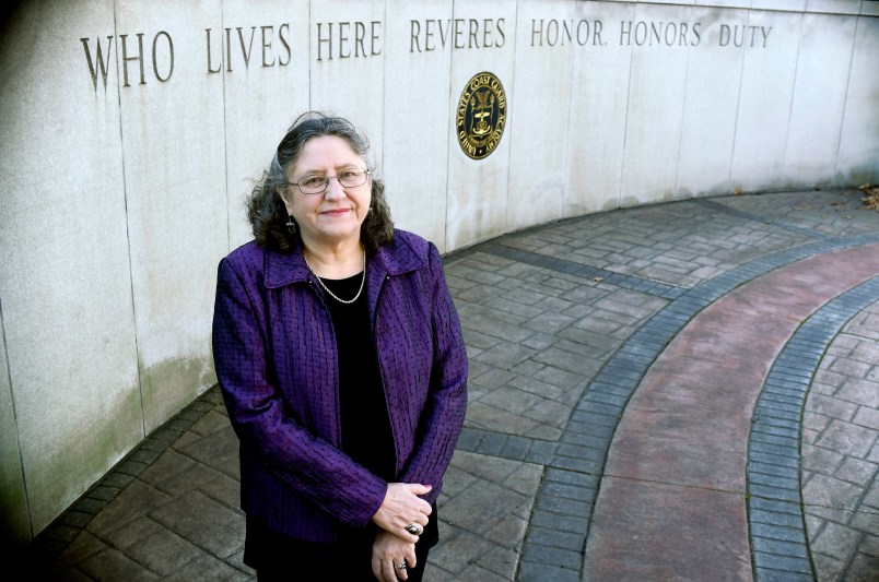 Michele Fitzpatrick, a retired lieutenant commander in the Coast Guard, poses for a photograph at the United States Coast Guard Academy in New London, Conn., Tuesday, Dec. 18, 2018. Female veterans, both current and former service members, were more likely to vote in the 2018 midterm elections for Democrats than Republicans, 60 percent to 36 percent, according to data from VoteCast. (AP Photo/Jessica Hill)