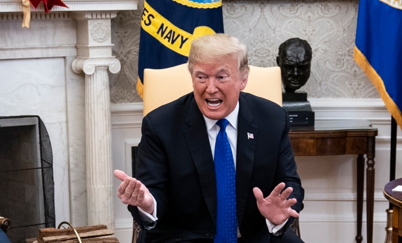 WASHINGTON, DC - DECEMBER 11 : President Donald J. Trump debates with House Minority Leader Nancy Pelosi, D-Calif., left, and Senate Minority Leader Chuck Schumer, D-N.Y., right, as Vice President Mike Pence listens during a meeting in the Oval Office of White House on Tuesday, Dec. 11, 2018 in Washington, DC. (Photo by Jabin Botsford/The Washington Post via Getty Images)