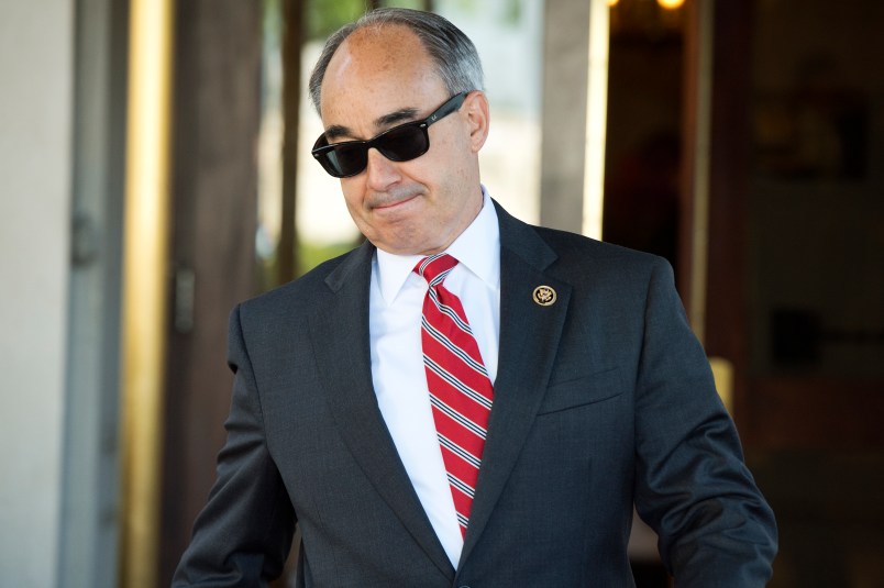 UNITED STATES - JUNE 16: Rep. Bruce Poliquin, R-Me., leaves a meeting of House Republicans at the at the RNC, June 16, 2014. (Photo By Tom Williams/CQ Roll Call)