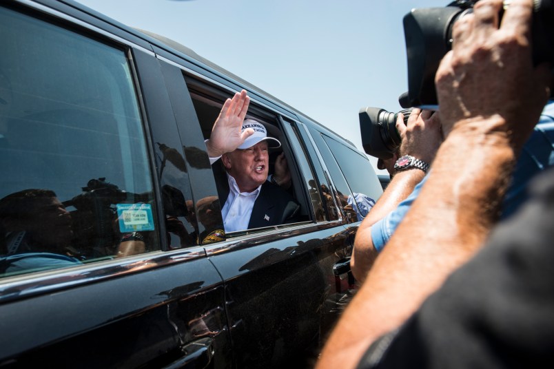 LAREDO, TEXAS - JULY 23:  Republican Presidential candidate and business mogul Donald Trump exits his plane during his trip to the border on July 23, 2015 in Laredo, Texas. Trump's recent comments, calling some immigrants from Mexico as drug traffickers and rapists, have stirred up reactions on both sides of the aisle. Although fellow Republican presidential candidate Rick Perry has denounced Trump's comments and his campaign in general, U.S. Senator from Texas Ted-Cruz has so far refused to bash his fellow Republican nominee. (Photo by Matthew Busch/Getty Images)