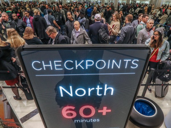 January 14, 2019 Atlanta: Security lines at Hartsfield-Jackson International Airport stretched more than an hour long Monday morning, Jan. 14, 2019 causing travelers to miss flights amid the partial federal shutdown. At a time when the world’s busiest airport has its biggest crowds, there were at least six security lanes closed at domestic terminal security checkpoints, while passengers waited in lines that stretched through the terminal and were winding through baggage claim. The long lines signaled staffing shortages at security checkpoints, as TSA officers have been working without pay since the federal shutdown began Dec. 22. Airport officials normally advise travelers to get to the airport two hours before domestic flights, but on Monday morning Hartsfield-Jackson spokesman Andrew Gobeil advised that travelers should consult with their airlines. Travelers may need to get to the airport even earlier due to the long waits. JOHN SPINK/JSPINK@AJC.COM