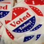 DES MOINES, IA - OCTOBER 08:  Stickers are made available to voters who cast a ballot in the midterm elections at the Polk County Election Office on October 8, 2018 in Des Moines, Iowa. Today was the first day of early voting in the state.  (Photo by Scott Olson/Getty Images)