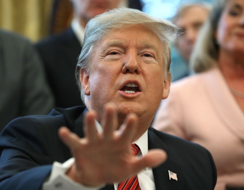 WASHINGTON, DC - JANUARY 09:  U.S. President Donald Trump speaks to the media after signing Anti-Human Trafficking LegislationÊin the Oval Office on January 9, 2019 in Washington, DC. President Trump also spoke about the stalemate between congressional leaders to come to a bipartisan solution for more money to build a wall along the U.S.-Mexico border.  (Photo by Mark Wilson/Getty Images)