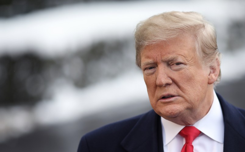 WASHINGTON, DC - JANUARY 14: U.S. President Donald Trump answers questions from the press as he departs the White House January 14, 2019 in Washington, DC. Trump is scheduled to travel to New Orleans today to address the American Farm Bureau Federation‚Äôs 100th annual convention. (Photo by Win McNamee/Getty Images)