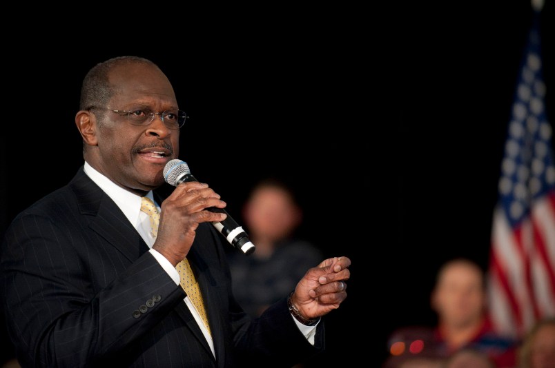 ROCK HILL, SC - DECEMBER 2:  Republican presidential candidate Herman Cain speaks to supporters during a town hall meeting at Laurel Ridge on December 2, 2011 in Rock Hill, South Carolina. Cain said he would make an announcement about his campaign in Atlanta tomorrow.  (Photo by Davis Turner/Getty Images)