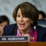 Senate Judiciary Committee member Sen. Amy Klobuchar, D-Minn., questions Attorney General nominee William Barr during a Senate Judiciary Committee hearing on Capitol Hill in Washington, Tuesday, Jan. 15, 2019. (AP Photo/Carolyn Kaster)