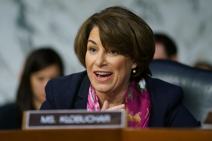 Senate Judiciary Committee member Sen. Amy Klobuchar, D-Minn., questions Attorney General nominee William Barr during a Senate Judiciary Committee hearing on Capitol Hill in Washington, Tuesday, Jan. 15, 2019. (AP Photo/Carolyn Kaster)