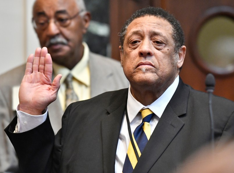 FILE - In this Jan. 8, 2019 file photo, incoming state Rep. Jim Glenn, D-Owensboro, is sworn in during a ceremony at the Kentucky House of Representatives in Frankfort, Ky. Election officials in Kentucky are reviewing ballots cast in a Kentucky House race where Glenn was elected by just one vote. The Democrat defeated Republican state Rep. DJ Johnson by one vote in November. But the Republican-controlled state legislature ordered a recount in the race after Johnson asked for it. (AP Photo/Timothy D. Easley, File)