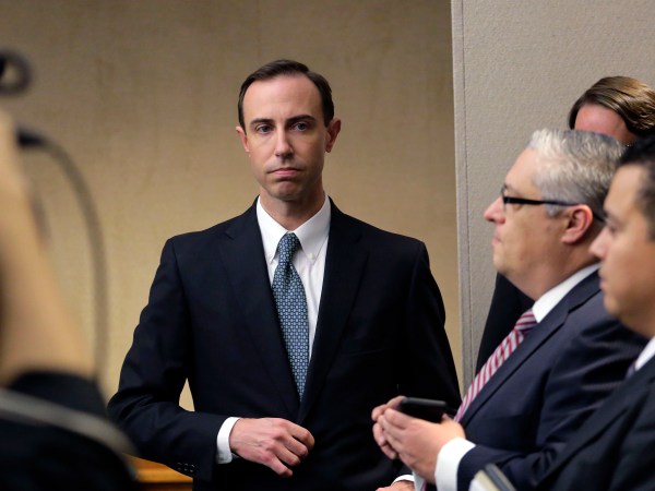 Secretary of State David Whitley, left, arrives for his confirmation hearing, Thursday, Feb. 7, 2019, in Austin, Texas, where he addressed the backlash surrounding Texas' efforts to find noncitizens on voter rolls. Whitley denies his office made mistakes over a list of 95,000 voters whose U.S. citizenship was called into question but included thousands of wrongly flagged names. (AP Photo/Eric Gay)