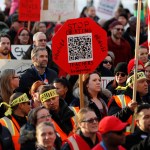 FILE - In this Jan. 30, 2019, file photo, Denver Public Schools teachers rally outside the State Capitol in Denver. Teachers plan to strike next week after Colorado officials declined to intervene in a pay dispute between the educators and the school district. State officials said Wednesday, Feb. 6, 2019, they believe the two sides are close to a negotiated agreement. Gov. Jared Polis said he expects the Denver Public Schools system and the union representing teachers to keep talking through the week to try to avoid a strike. (AP Photo/David Zalubowski, File)