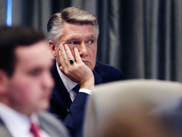 Mark Harris listens to the public evidentiary hearing on the 9th Congressional District investigation Monday afternoon, Feb. 18, 2019, at the North Carolina State Bar in Raleigh.
