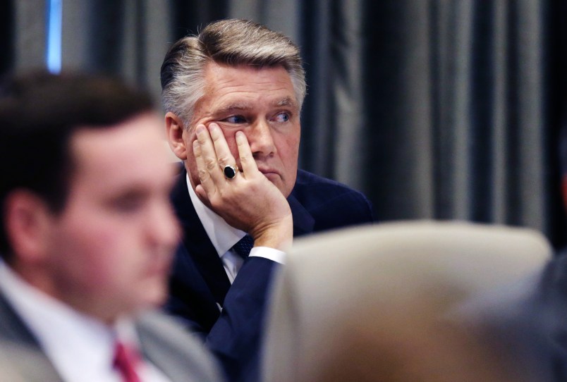 Mark Harris listens to the public evidentiary hearing on the 9th Congressional District investigation Monday afternoon, Feb. 18, 2019, at the North Carolina State Bar in Raleigh.