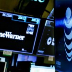 The logos for Time Warner and AT&T appear above alternate trading posts on the floor of the New York Stock Exchange, Wednesday, June 13, 2018. A federal judge has approved the $85 billion mega-merger of AT&T and Time Warner, potentially ushering in a wave of media consolidation while shaping how much consumers pay for streaming TV and movies. (AP Photo/Richard Drew)