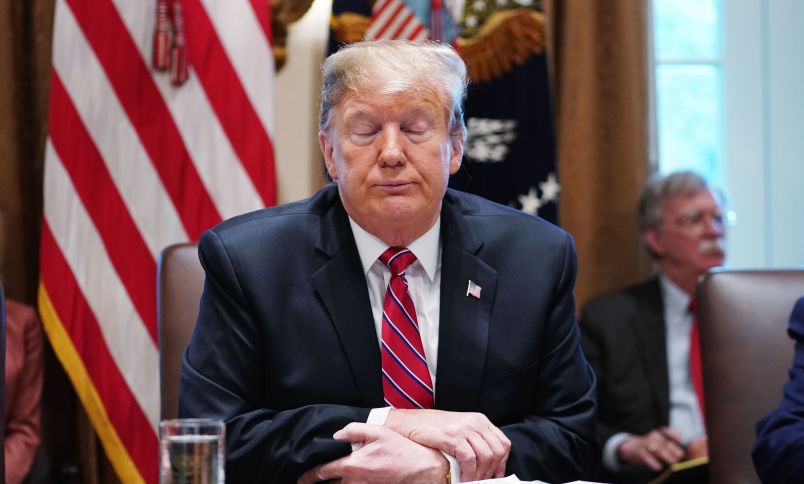 TOPSHOT - US President Donald Trump speaks during a cabinet meeting in the Cabinet Room of the White House in Washington, DC on February 12, 2019. - US President Donald Trump on Tuesday said he wasn't "happy" with a preliminary deal by US lawmakers to provide funding for a border wall with Mexico but added another government shutdown was not likely. "I can't say I'm happy, I can't say I'm thrilled," he told a cabinet meeting in the White House.But he indicated he could supplement the offer from Congress from other sources and lay the dispute to rest. (Photo by MANDEL NGAN / AFP)        (Photo credit should read MANDEL NGAN/AFP/Getty Images)