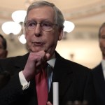 WASHINGTON, DC - FEBRUARY 05:  U.S. Senate Majority Leader Sen. Mitch McConnell (R-KY) (C) speaks to members of the media as Sen. John Barrasso (R-WY) (L) and Senate Majority Whip Sen. John Thune (R-SD) (R) listen after a weekly Senate Republican Policy Luncheon at the U.S. Capitol February 5, 2019 in Washington, DC. Senate GOPs held the weekly policy luncheon to discuss Republican agenda.  (Photo by Alex Wong/Getty Images)