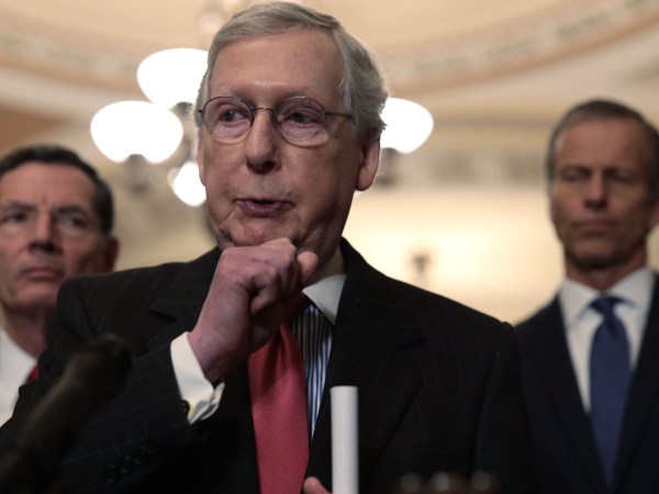 WASHINGTON, DC - FEBRUARY 05:  U.S. Senate Majority Leader Sen. Mitch McConnell (R-KY) (C) speaks to members of the media as Sen. John Barrasso (R-WY) (L) and Senate Majority Whip Sen. John Thune (R-SD) (R) listen after a weekly Senate Republican Policy Luncheon at the U.S. Capitol February 5, 2019 in Washington, DC. Senate GOPs held the weekly policy luncheon to discuss Republican agenda.  (Photo by Alex Wong/Getty Images)