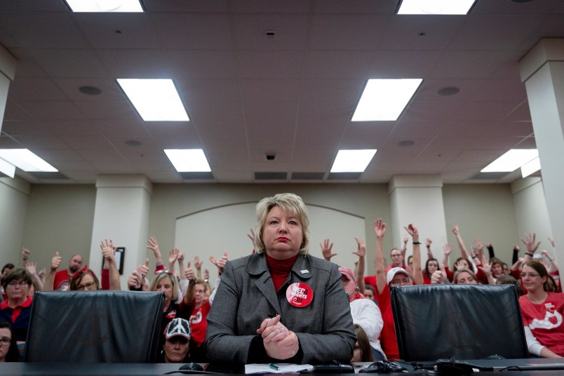 Kentucky Education Association President Stephanie Winkler speaks during a hearing on a bill that will change how individuals are nominated to the Kentucky teachers retirement systems board of trustees, in Frankfort, Ky, Thursday, Feb 28, 2019. (AP Photo/Bryan Woolston)