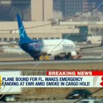 In this image taken from video provided by News12 New Jersey, Air Transat Flight 942 is towed along the runway at Newark Liberty International Airport, Saturday, March 9, 2019 in Newark NJ. The Boeing 737 with 189 passengers aboard made an emergency landing after a possible fire in the cargo hold was reported. Two passengers suffered minor injuries. No fire was found and the cause of the smoke remains under investigation. (News12 New Jersey via AP)