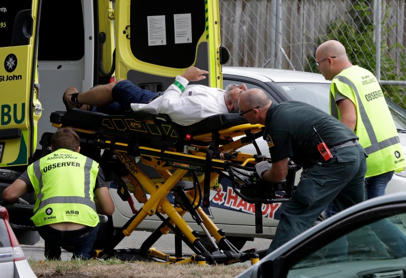 Ambulance staff take a man from outside a mosque in central Christchurch, New Zealand, Friday, March 15, 2019. (AP Photo/Mark Baker)